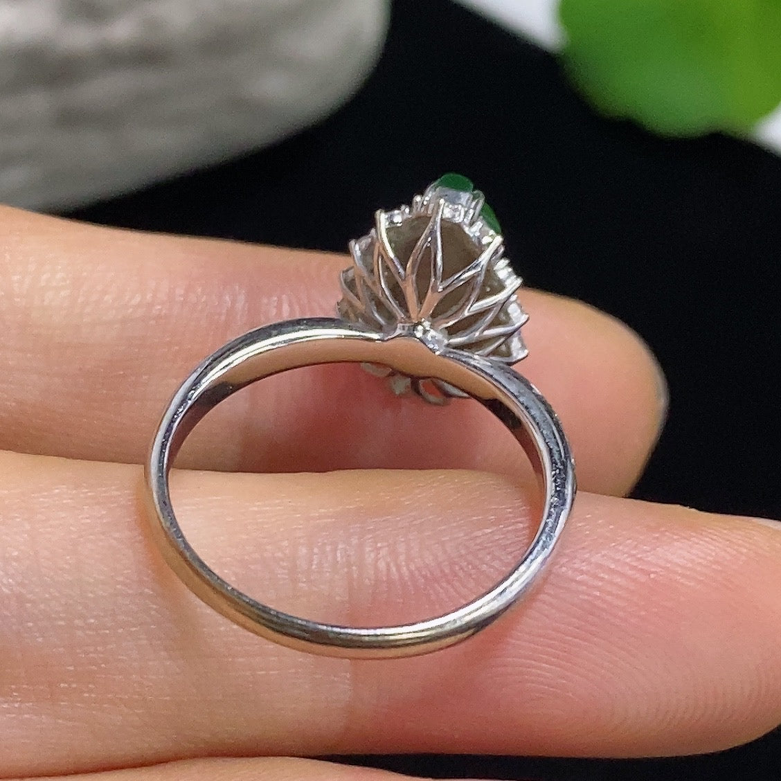 Jadeite gourd inlay ring with 18K gold and diamond accents, showcasing intricate craftsmanship and elegant design.