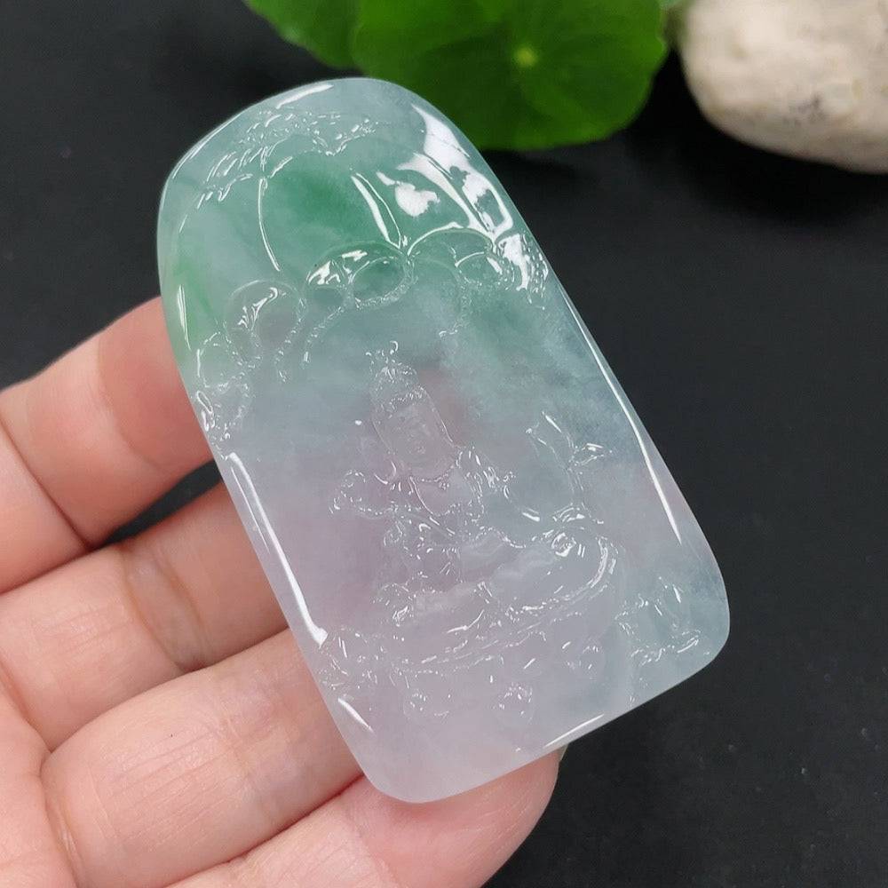 Jadeite Guanyin pendant with intricate carving, weighing approximately 28.8g, crafted by HUILIU HQ, featuring a detailed figure of Guanyin.