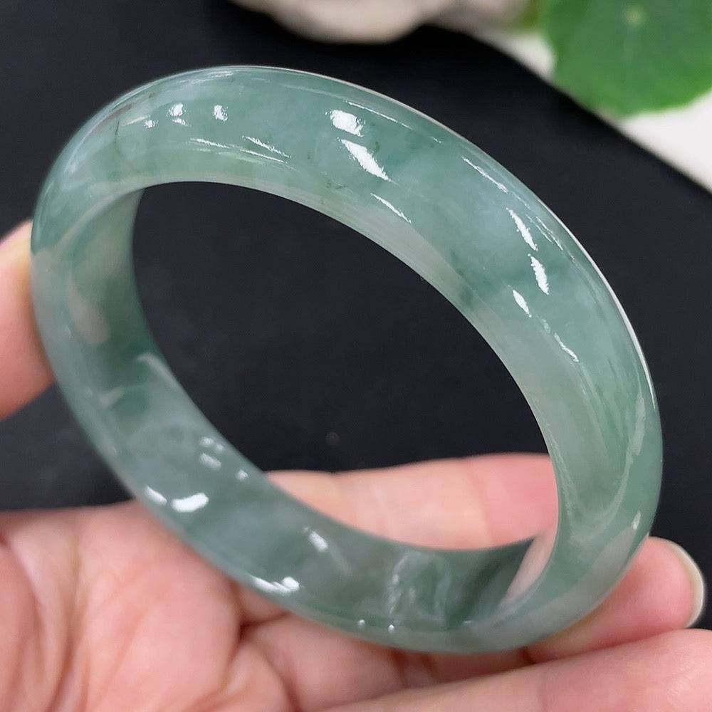 Huiliu certified jadeite round bracelet featuring smooth, polished green jade beads, elegant and handcrafted jewelry accessory.