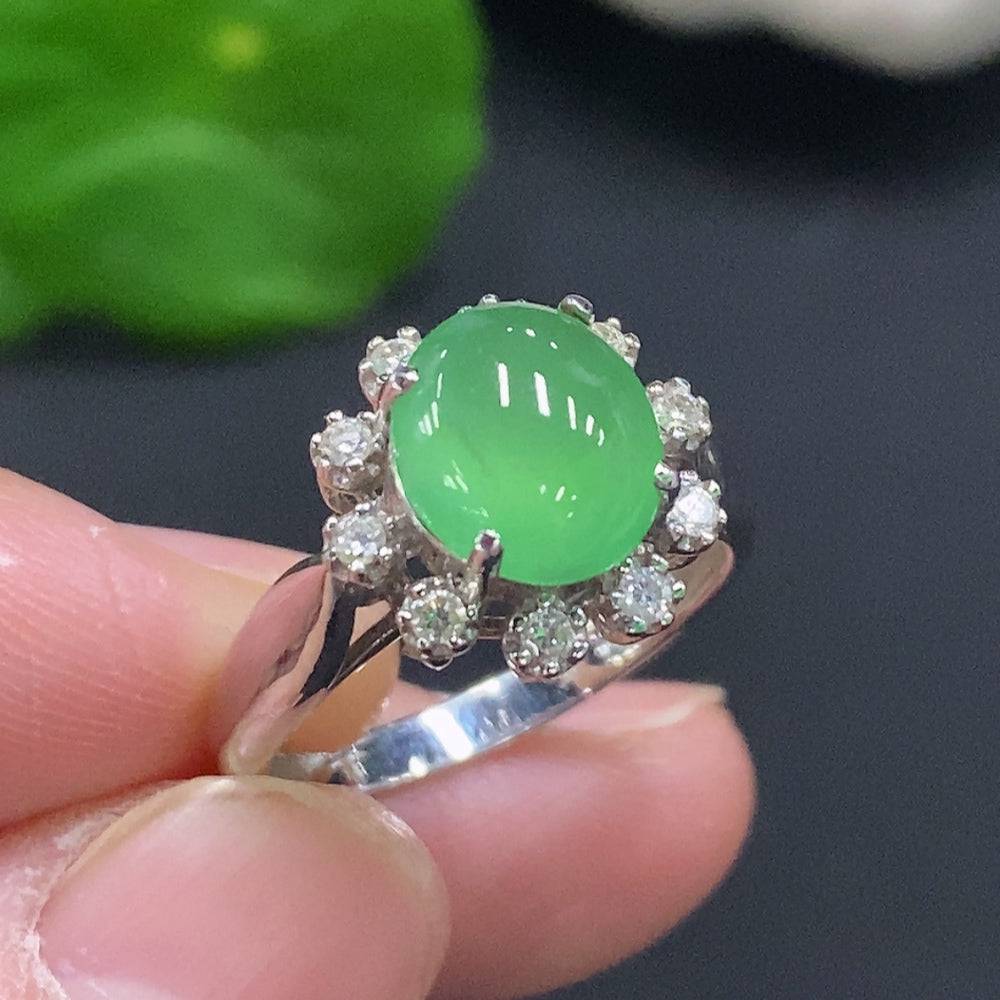 Jadeite cabochon solitaire ring with diamond accents in 18K gold, size 14, featuring a polished green jade stone.