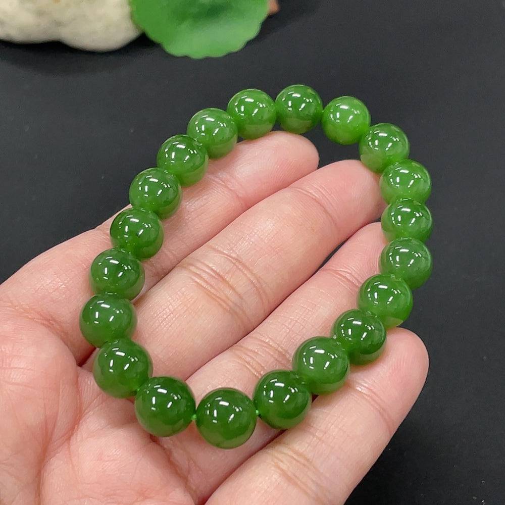 Heitian jade bracelet with 9.5mm beads, crafted by HUILIU HQ, showcasing smooth, polished jade stones and a secure clasp.