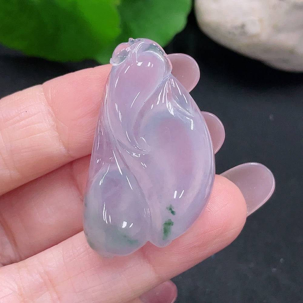 Huiliu Certified Jadeite pendant featuring a polished green jade stone with intricate carved details.