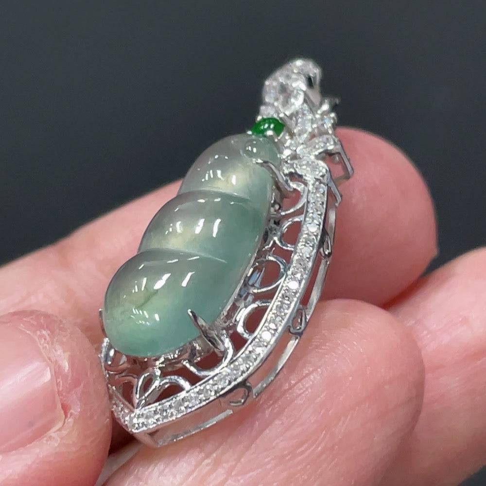 Jadeite blessing bean pendant with 18K gold setting and diamond accents, crafted by HUILIU HQ, weighing approximately 2.79g.