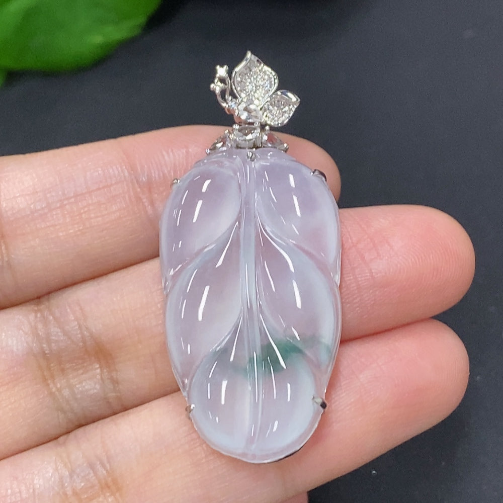 Jadeite leaf pendant necklace with 18K gold and diamond accents, elegant jewelry piece showcasing intricate leaf design and sparkling details.
