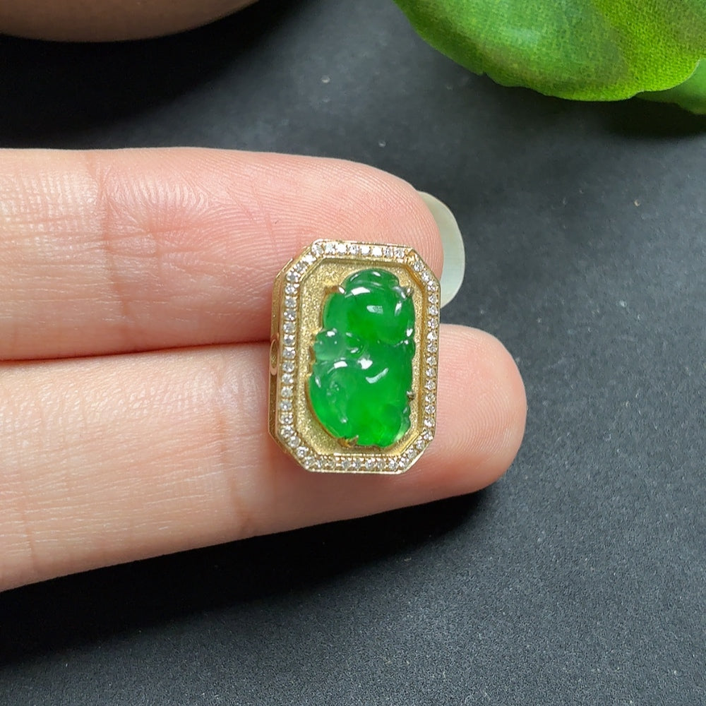 Jadeite inlaid pendant with diamond accents on a necklace, crafted in 18k gold, weighing approximately 2.25 grams.