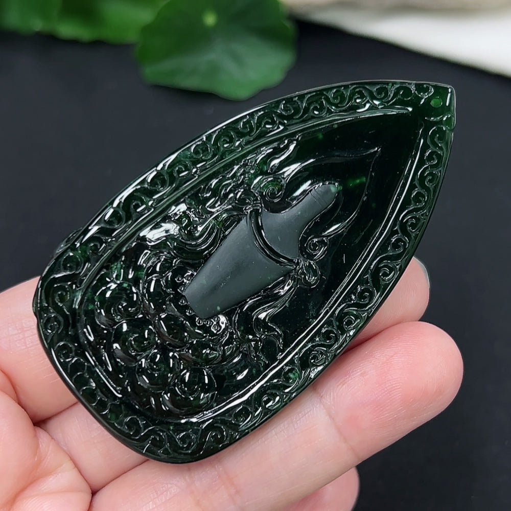 Jadeite Guanyin pendant necklace with detailed carving, weighs approximately 54.3g, made by HKHQ, displayed on a neutral background.