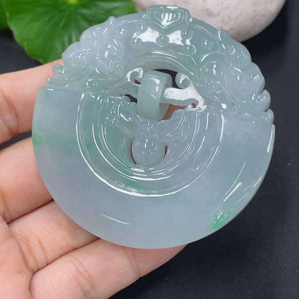 Antique jadeite pendant weighing about 73g with intricate carvings, from HUILIU HQ, showcasing smooth, polished jade surface.