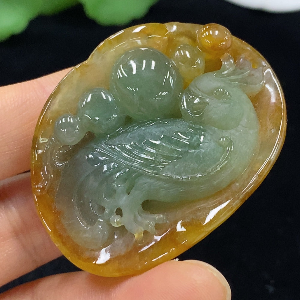 Huiliu certified jadeite pendant featuring smooth, polished green jade with a natural luster and elegant design.
