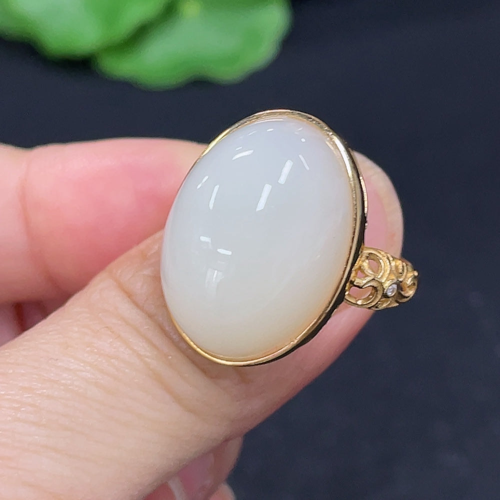 HKHQ Hetian Jade cabochon ring featuring inlaid jade stone and silver band, close-up of the elegant jewelry piece.