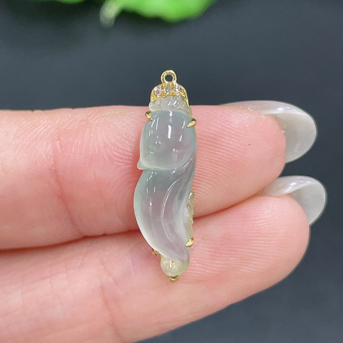 Jadeite pendant with 18k gold inlay and diamond accents, crafted by HKHQ, shown with intricate detailing and polished finish.