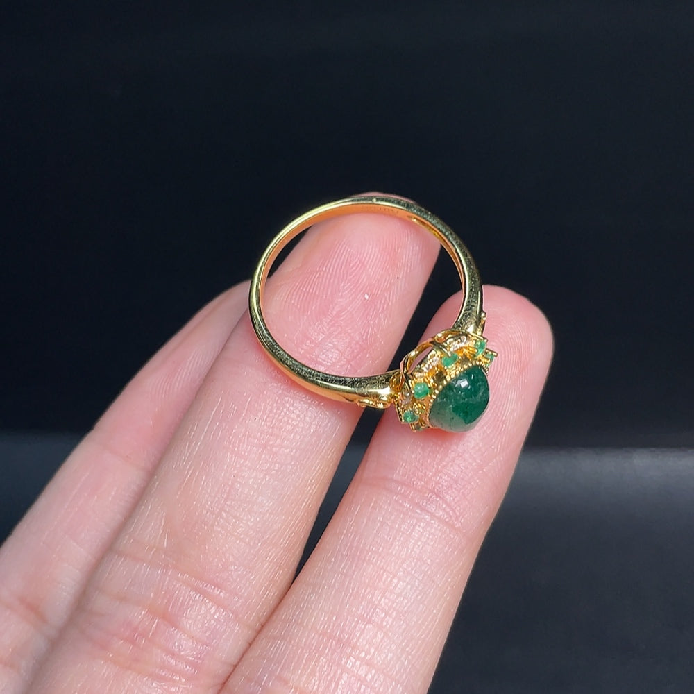HUILIU HQ emerald gemstone ring with colorless diamond accents, clarity enhanced, featuring natural-looking accent stones.