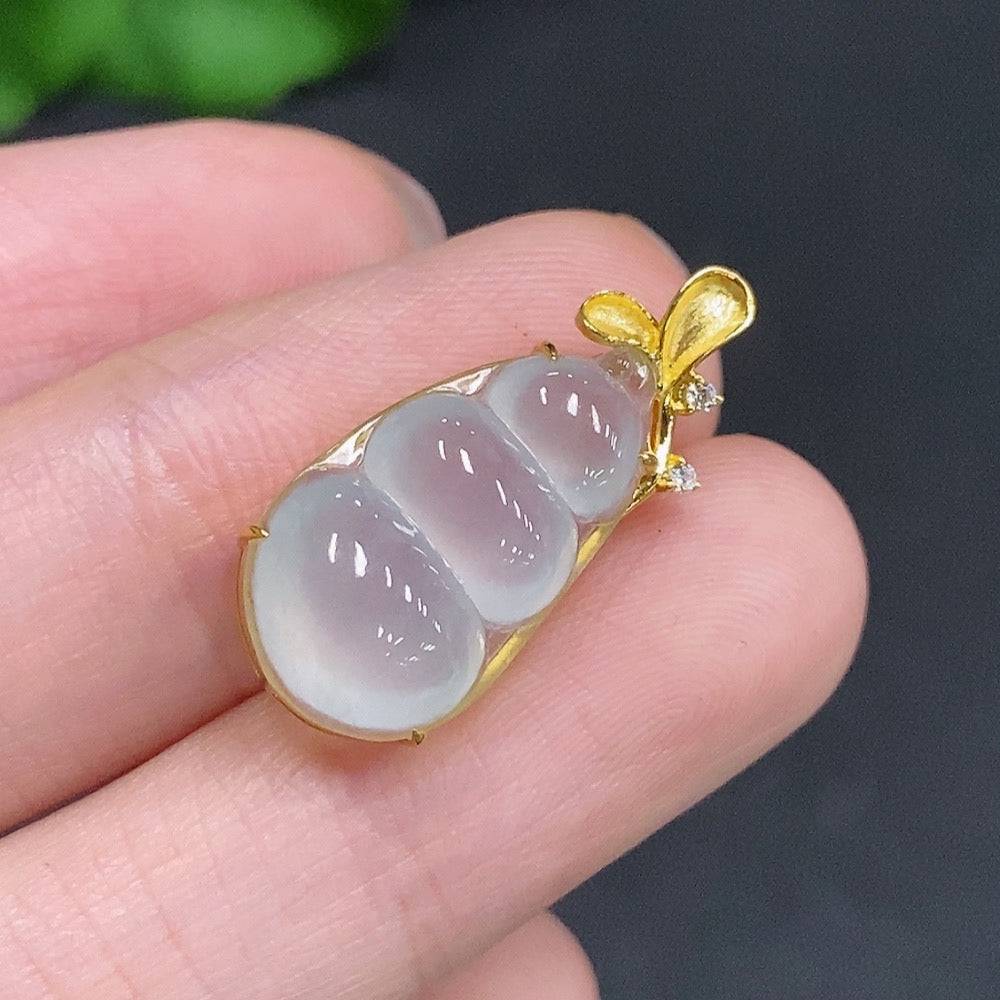 Jadeite lucky bean pendant with 18k gold and diamond accents, weighing approximately 2.4 grams, from HUILIU HQ.