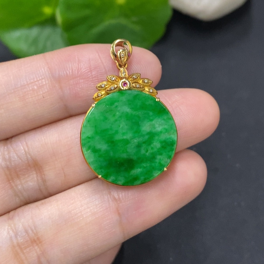 Jadeite plain pendant with 18K gold mount and diamond accents, featuring a smooth, polished jadeite stone on a delicate necklace.