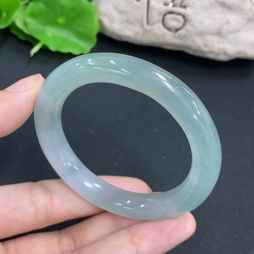 HKHQ jadeite round bangle, size 50.6, weighing 47.4g, showcasing smooth, polished green jadeite bracelet with a glossy finish.