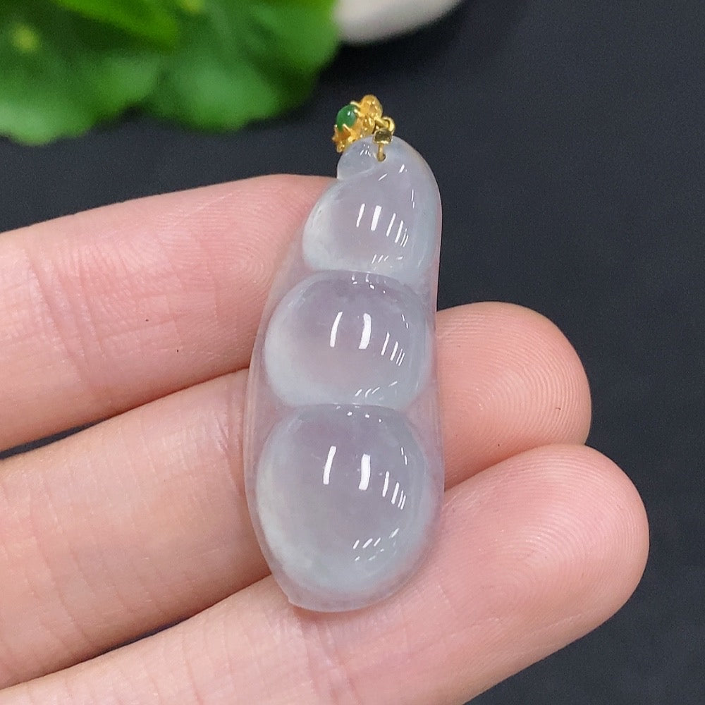 Jadeite lucky bean pendant by HUILIU HQ with 18K gold clasp and diamond accents, weighing approximately 5g, showcasing detailed craftsmanship.