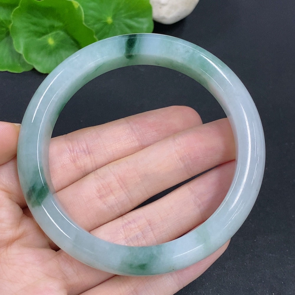 HKHQ jadeite round bangle, 65.6g, size 60, smooth green jade jewelry displayed on a plain background.