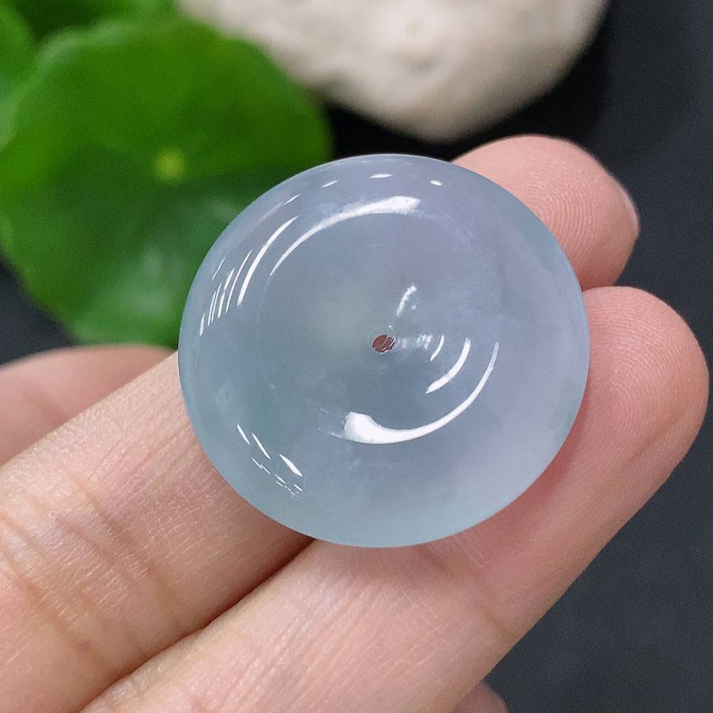 Jadeite pendant with peace knot design, weighing approximately 6.43g, crafted by HUILIU HQ, featuring smooth jade surface and intricate knot detail.