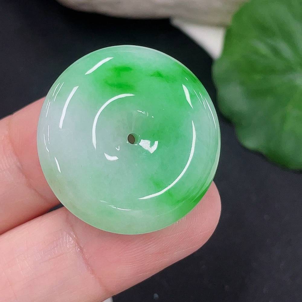 Jadeite Peace Knot pendant by HUILIU HQ, approximately 8.1g, featuring a smooth, polished jade pendant with intricate knot design.