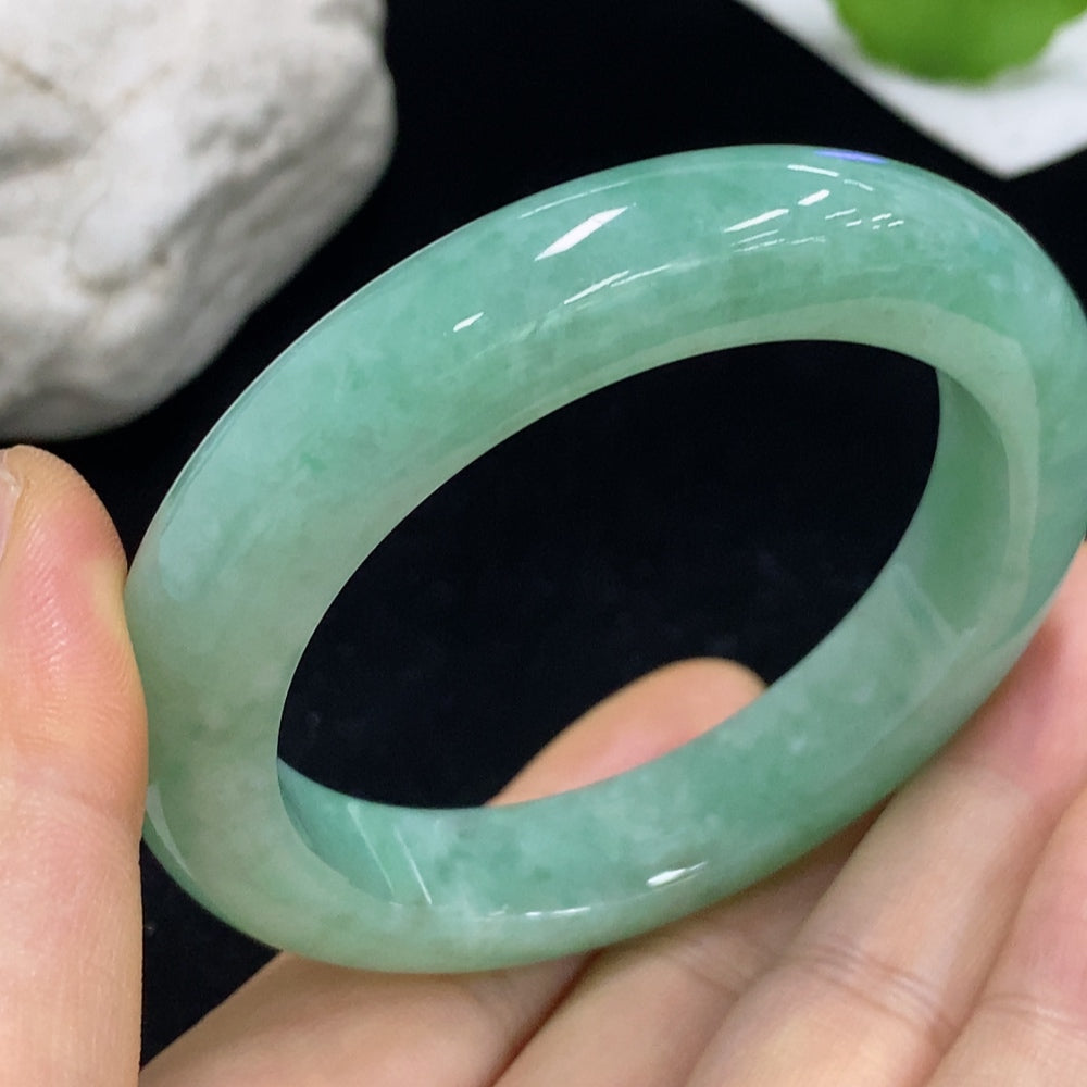 Jadeite round bracelet with a 53mm size, approximately 57.71g, featuring smooth jade stones from HKHQ.