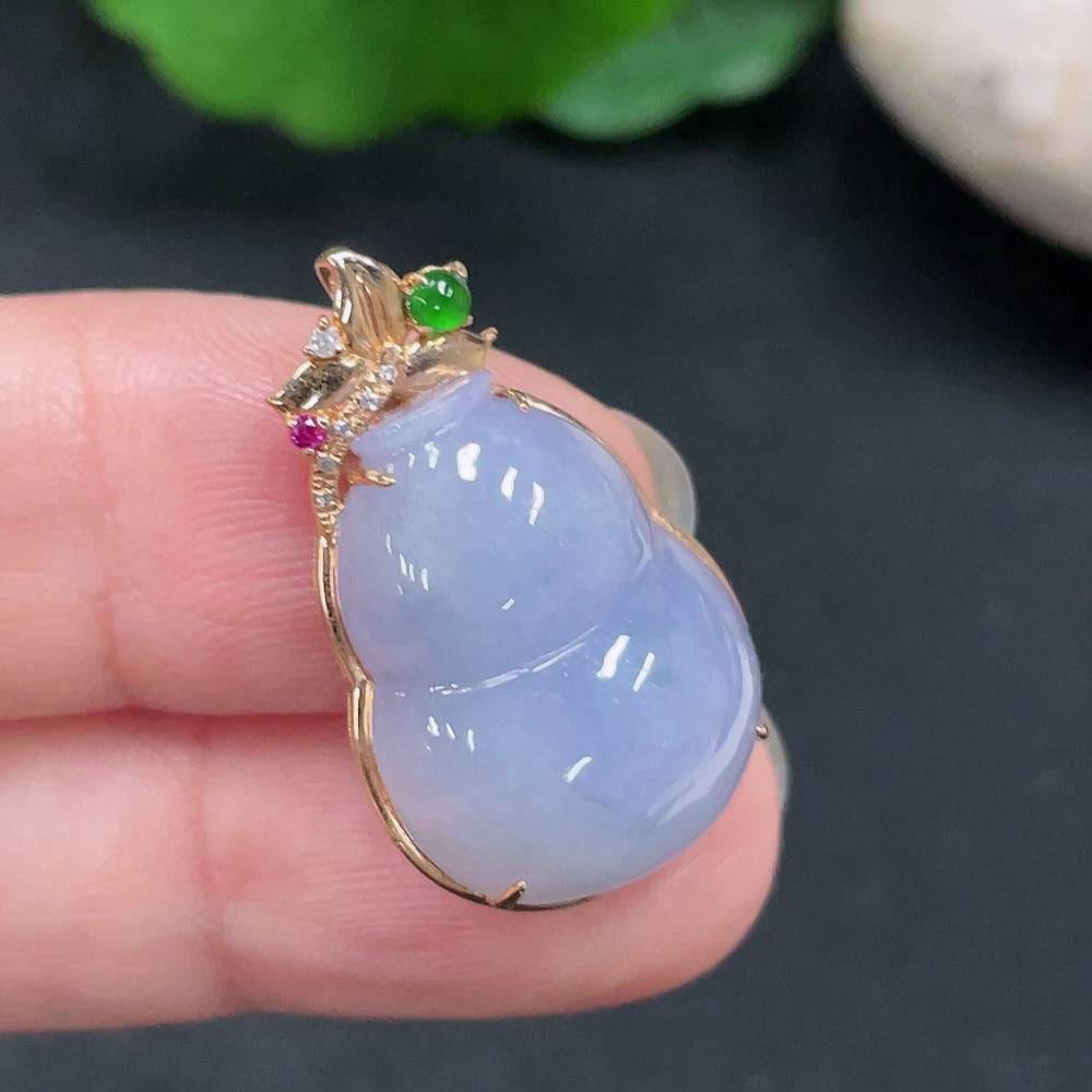 Huiliu Jadeite gourd pendant with inlaid design, crafted from green jade, showcasing intricate craftsmanship and smooth surface.