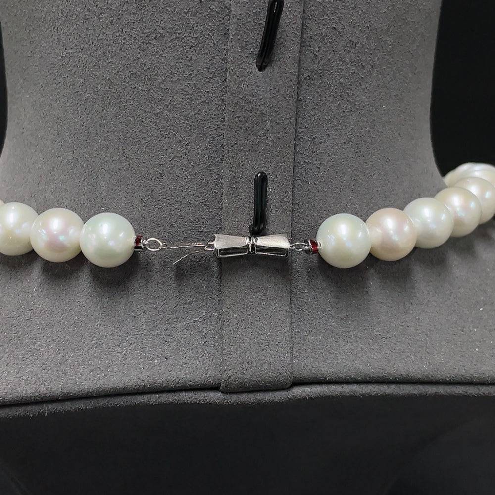 Huiliu Pearl bead necklace with 9.9-10.8mm white pearls, featuring red-marked beads, photographed against a neutral background.