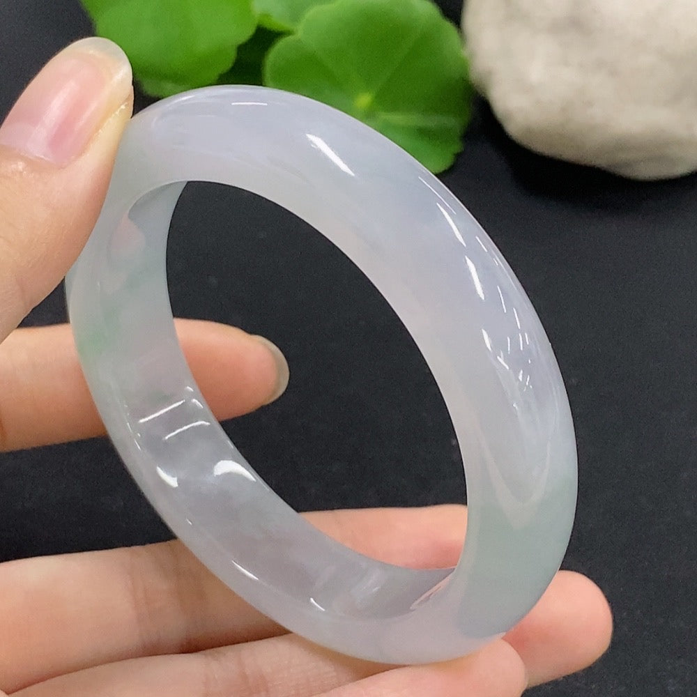 HKHQ jadeite round bangle in size 54.5 with a weight of 58.84g, showcasing smooth, polished green jadeite bracelet.