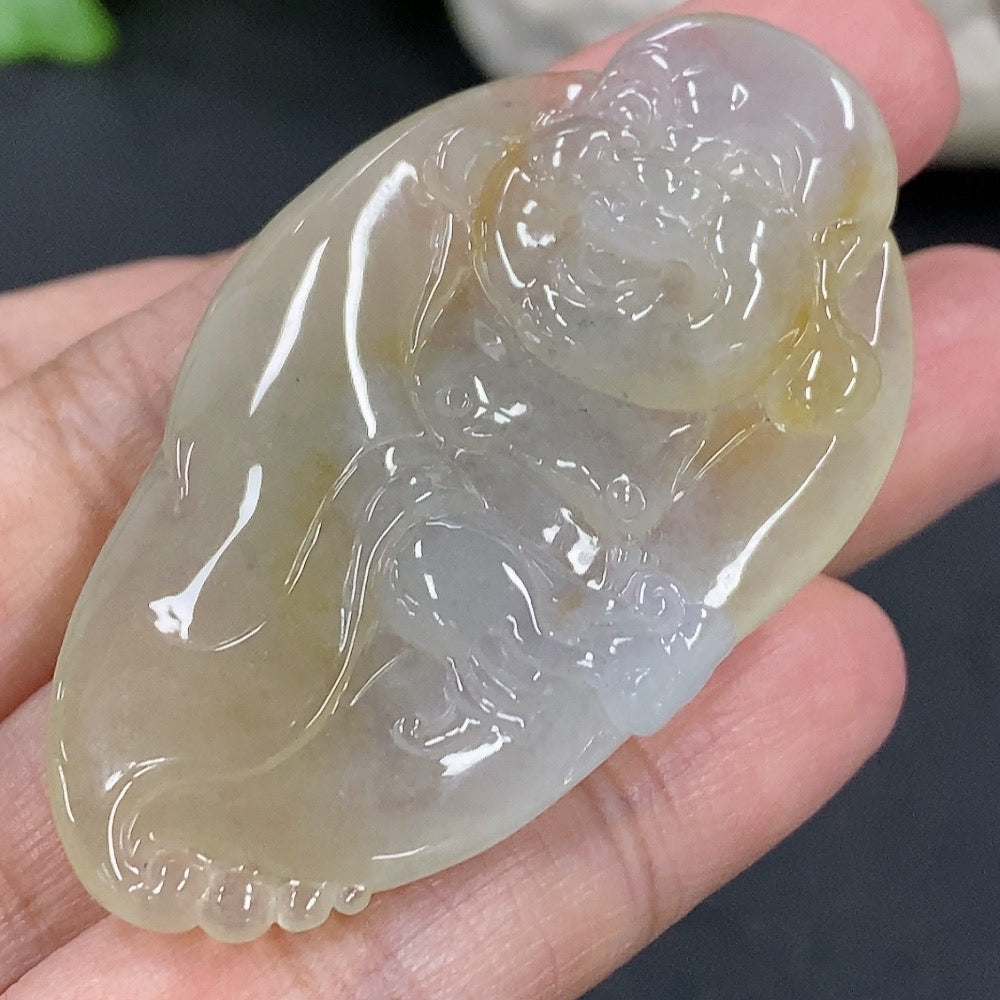 Jadeite Buddha pendant with intricate carvings, weighing approximately 19.6g, crafted from high-quality green jade by HKHQ.