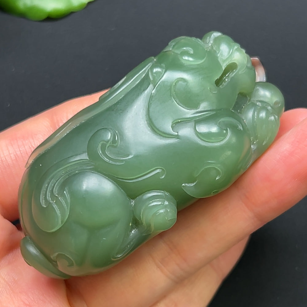 Hetian Jade Pixiu pendant necklace featuring intricate jade carving, crafted by HKHQ, showcasing traditional Chinese jewelry design.