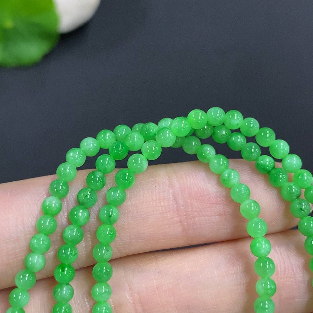 Jadeite bead necklace with 3.3mm jade beads, non-gold, weighing approximately 12.5g, featuring smooth, polished green jade beads.
