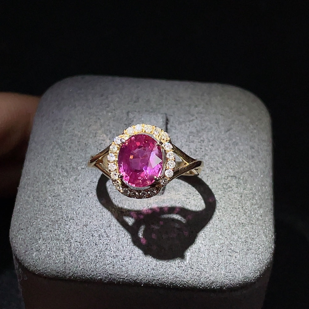 18K sapphire and diamond accent ring by HUILIU HQ, size 14, showcasing vibrant blue gemstones and sparkling accents.