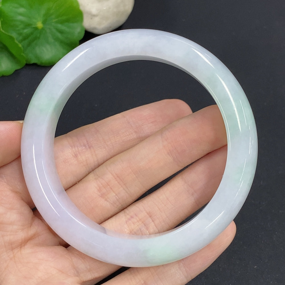 HKHQ jadeite round bangle size 58.7 with approx. 68.3g weight, smooth polished jade jewelry shown on a plain background.