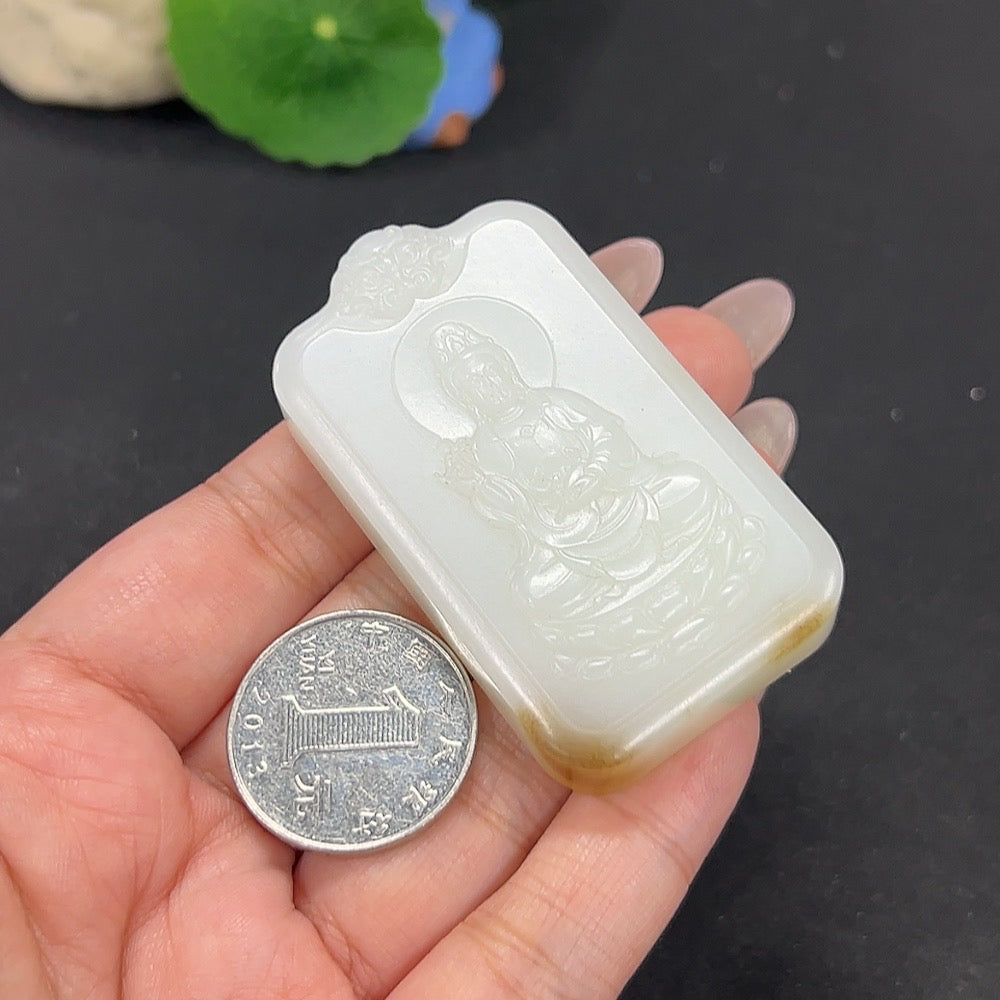 Hetian Jade Guanyin pendant from HKHQ, carved in smooth jade, weighs approximately 61.3g, detailed and elegant in style.