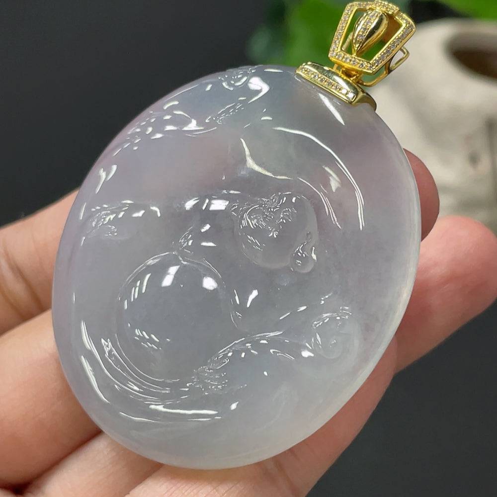 Jadeite Buddha pendant with 18K gold clasp and diamond accents, weighing approximately 34.4g, from HUILIU HQ.
