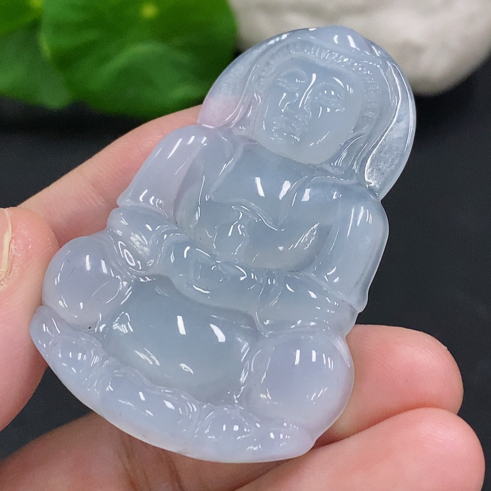 Huiliu Jadeite Guanyin pendant hanging with intricate carvings, certified jade jewelry, detailed craftsmanship, natural stone appearance