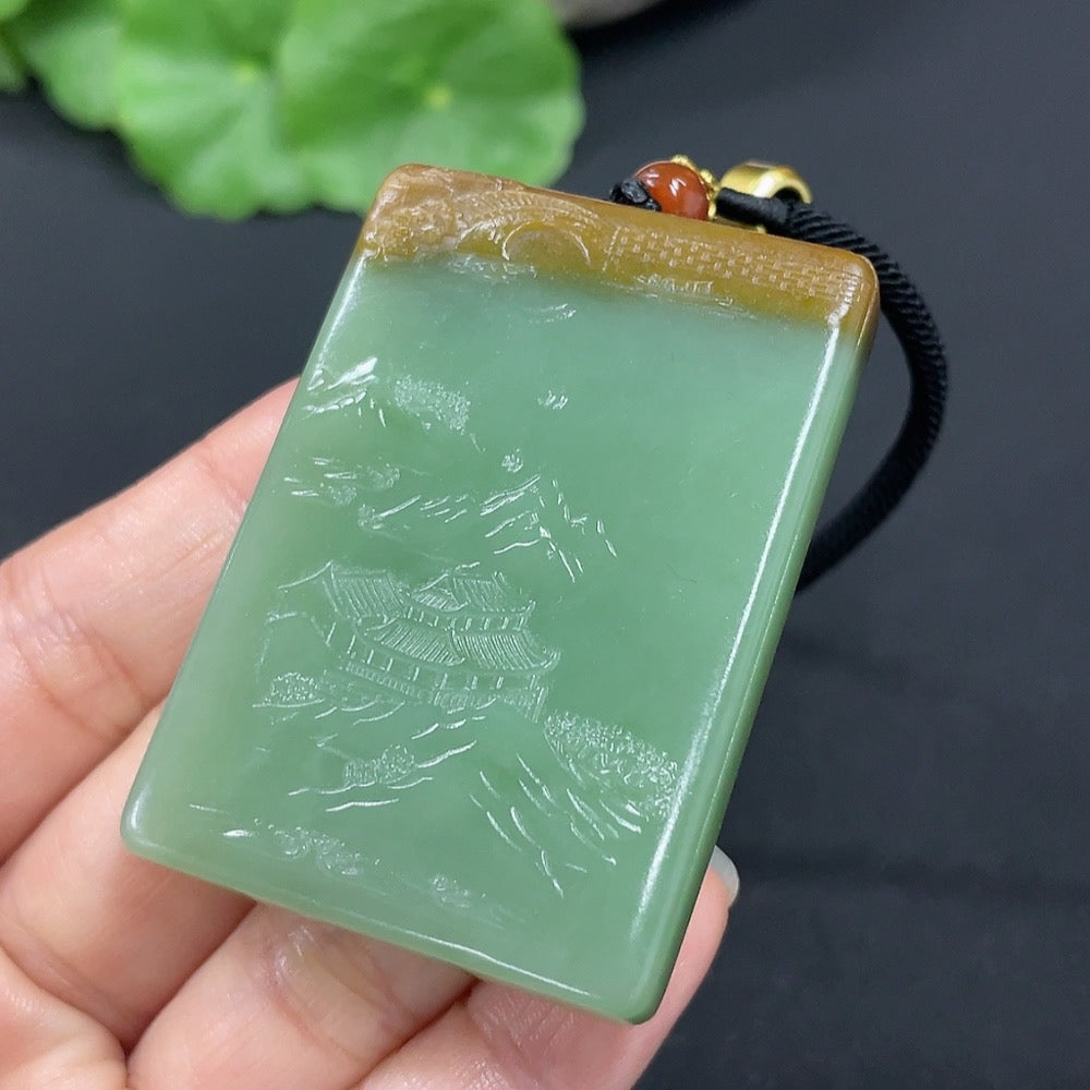 Huiliu certified Hetian jade Guanyin pendant showcasing intricate carvings and smooth polished surface.