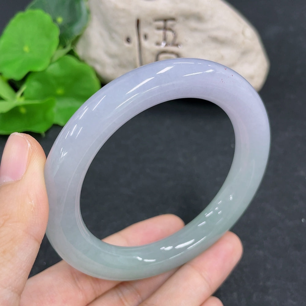 HKHQ jadeite round bangle in size 57.1, weighing 70.28g, showcasing smooth, polished jadeite with a glossy finish.