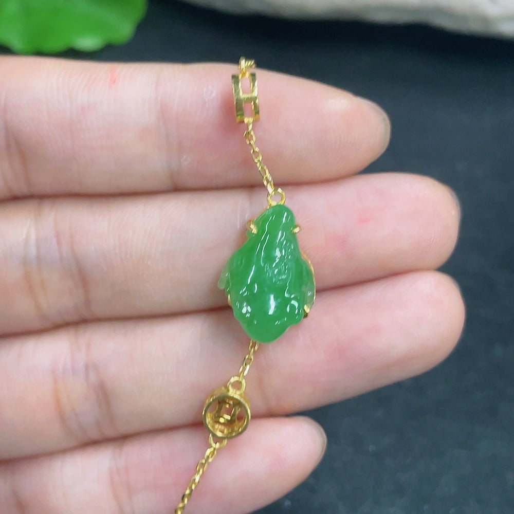 Jadeite bracelet with 18K gold and diamond accents, featuring smooth jade stones and elegant design by HKHQ.