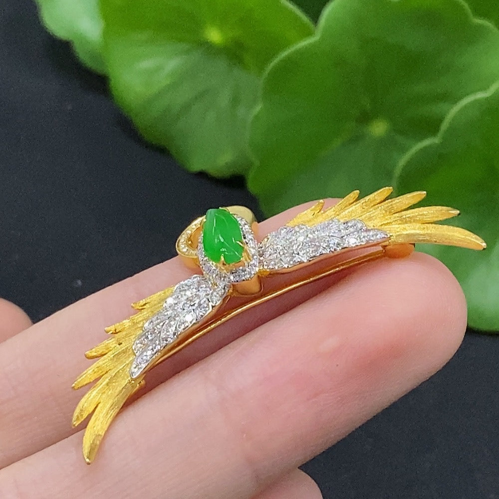 Jadeite inlaid brooch with 18K gold and diamond accents, featuring intricate jade design and elegant craftsmanship.