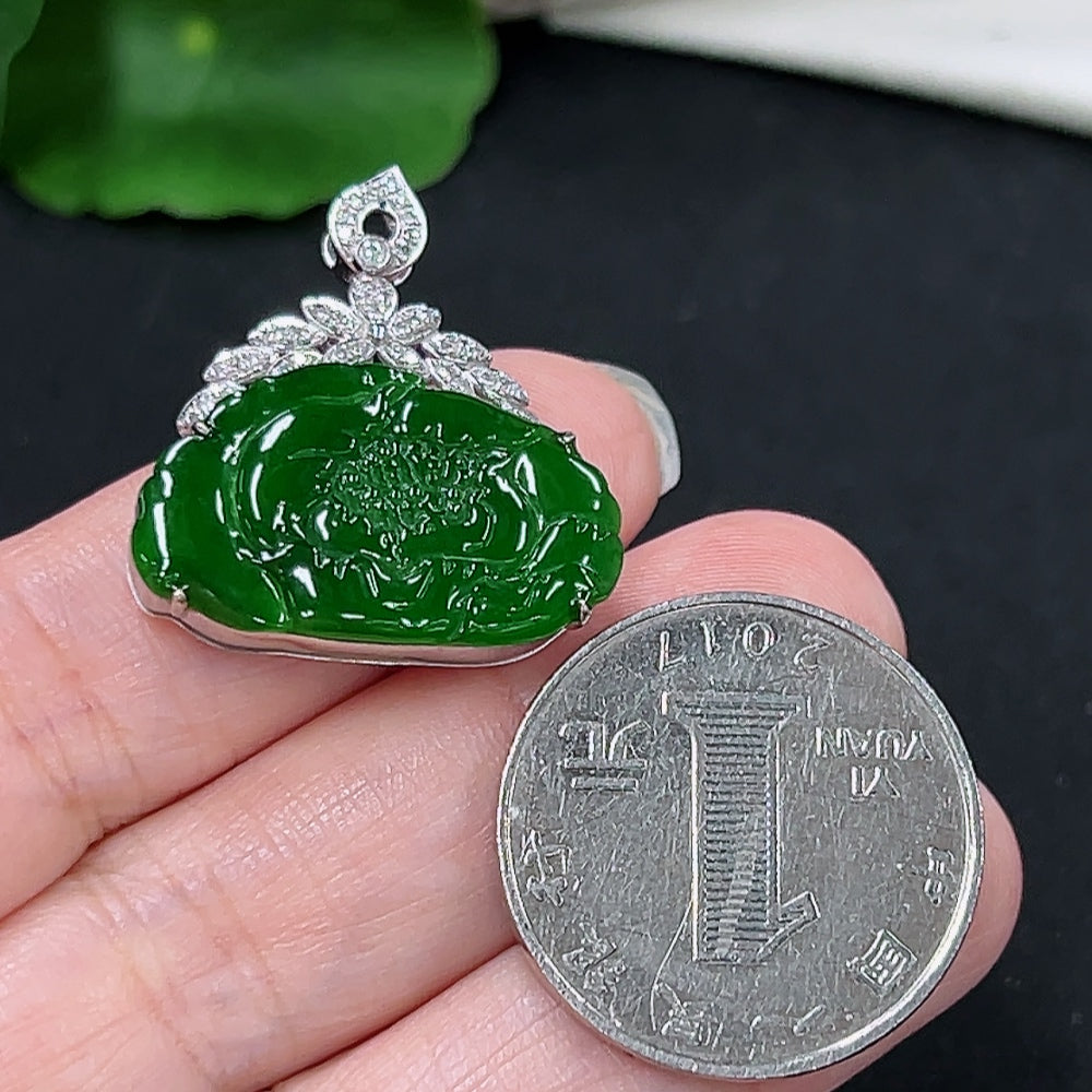 Jadeite pendant with 18K gold setting and diamond accents, elegant necklace featuring a polished jadeite stone.