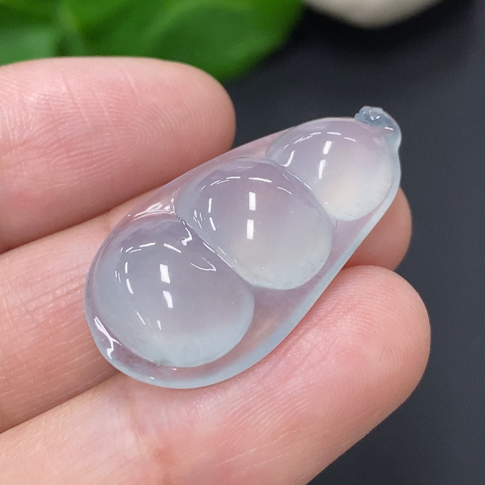Huiliu Jadeite Blessed Bean Inlay Piece showcasing smooth green jade with intricate inlay details, certified by Huiliu HQ