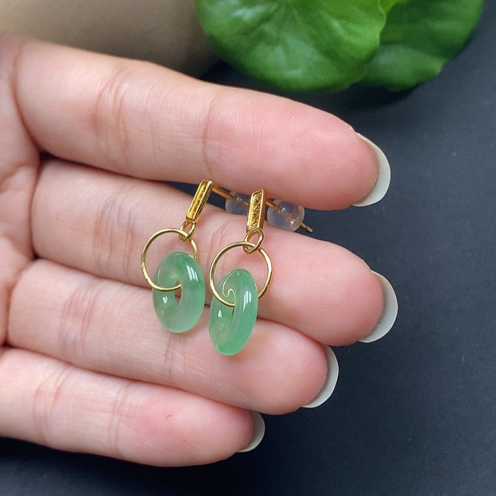 Jadeite inlaid earrings with peace knot design in 18k gold, featuring green jade stones, weight approx. 2.57g.