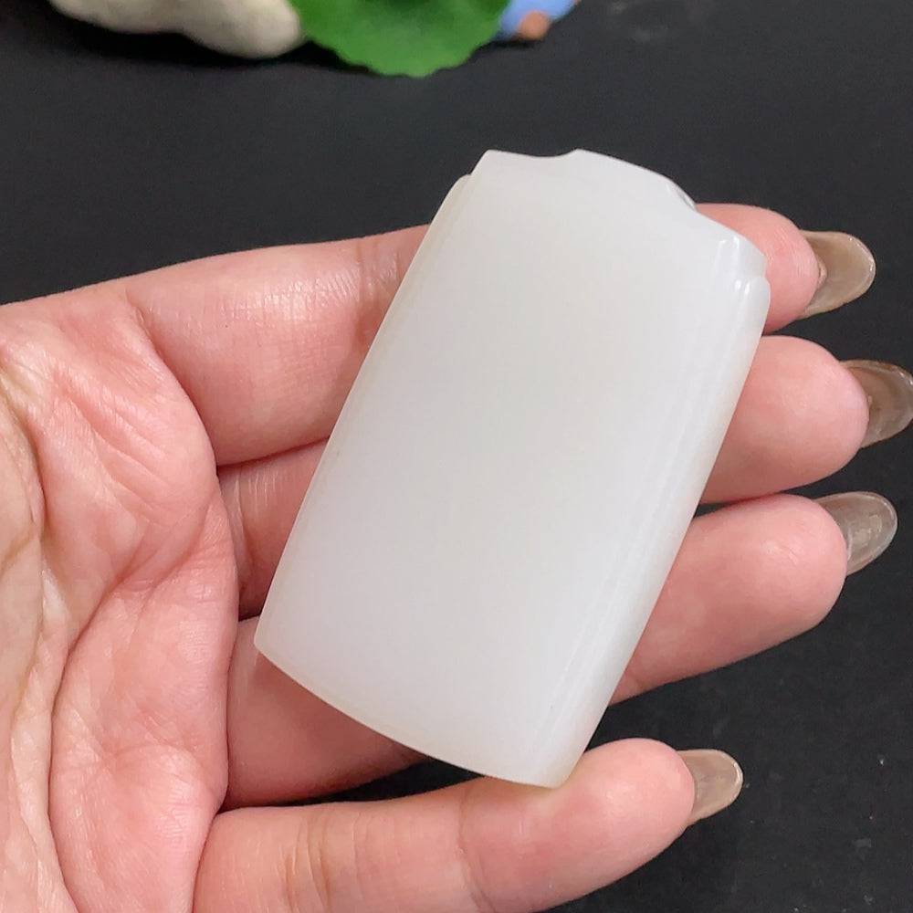 Huiliu certified Hetian jade pendant with smooth, plain design showcasing rich green jade stone on a neutral background.