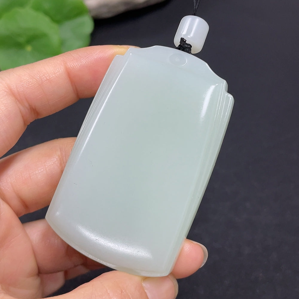 Hetian Jade plain pendant necklace by HKHQ, showcasing a smooth, polished jade pendant weighing 60.5g on a delicate chain.