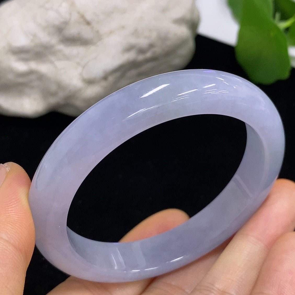 HKHQ jadeite round bangle in size 52.4 with a polished finish, weighs 41.97g, showcasing smooth, vibrant green jadeite.