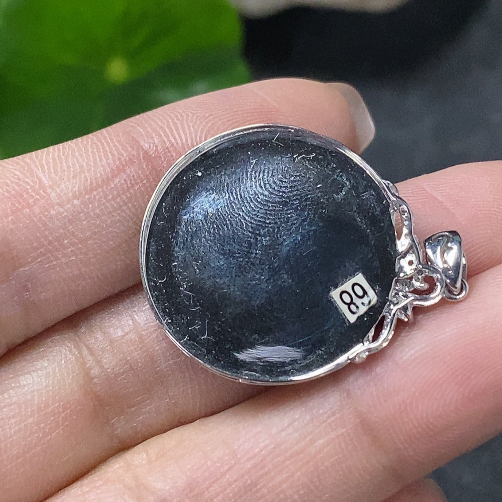 HUILIU HQ jadeite inlaid safety buckle pendant with diamonds showing cracks and damage, featuring intricate jade craftsmanship.