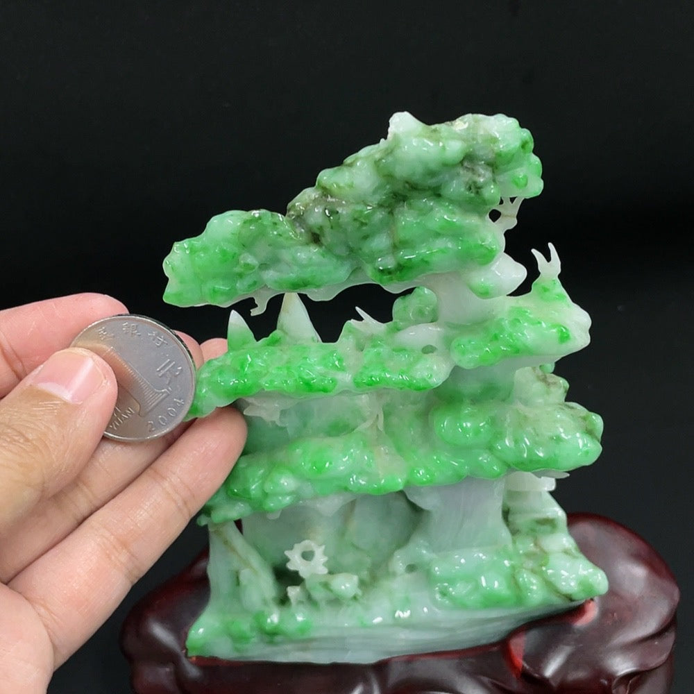 Jadeite ornament with base, weighs approximately 459.39g, crafted by HKHQ, showcasing smooth, polished green jade surface.