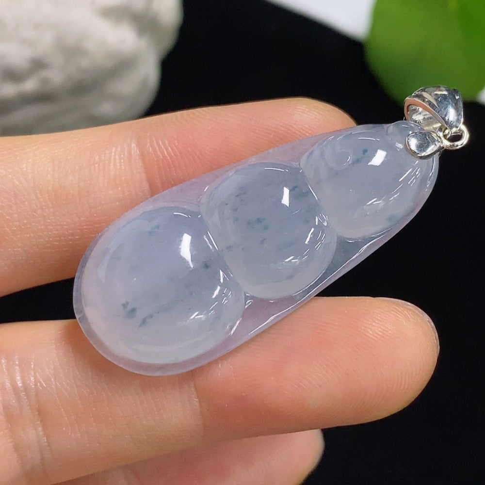 Jadeite Lucky Bean Pendant necklace by HKHQ featuring a smooth, green jadeite bean on a simple cord.