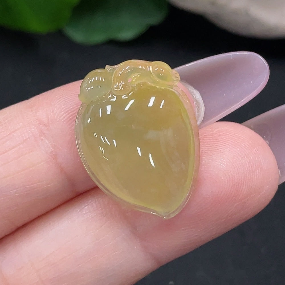Jadeite pendant featuring fortune and longevity symbols, crafted by HUILIU HQ, showing detailed carved design on smooth jade surface