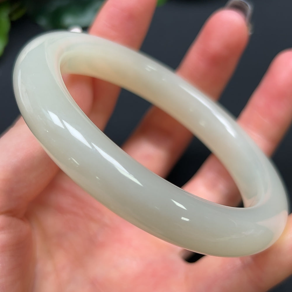 HKHQ Hetian Jade round bracelet, 58.9mm size, approximately 56.79g, featuring smooth, polished jade beads on a string.