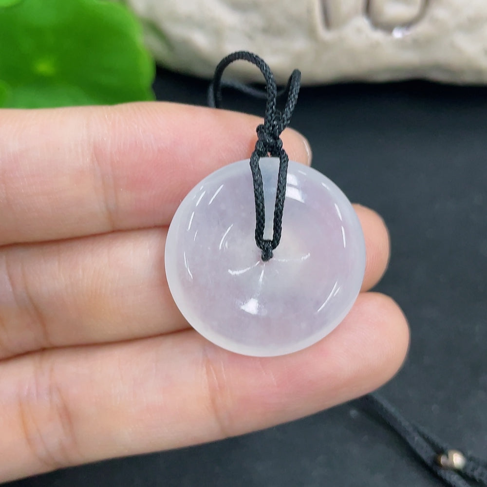 Jadeite pendant necklace from HKHQ featuring a polished green jadeite stone, weight approximately 6.8 grams.